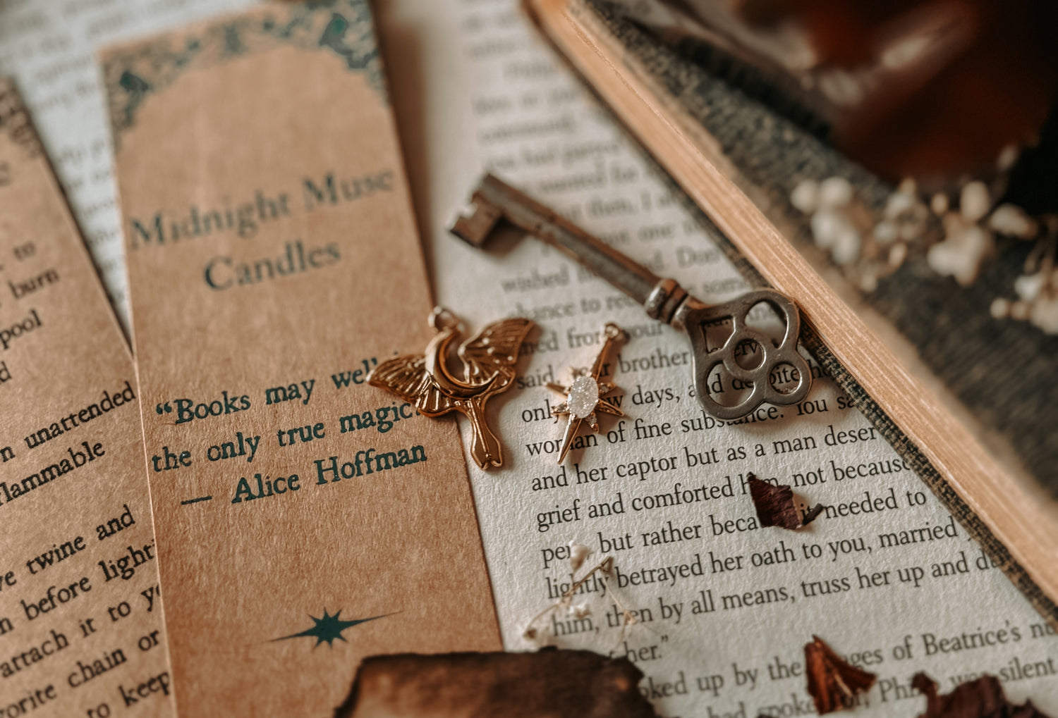 Decorative key with a tag on an open book with dried leaves