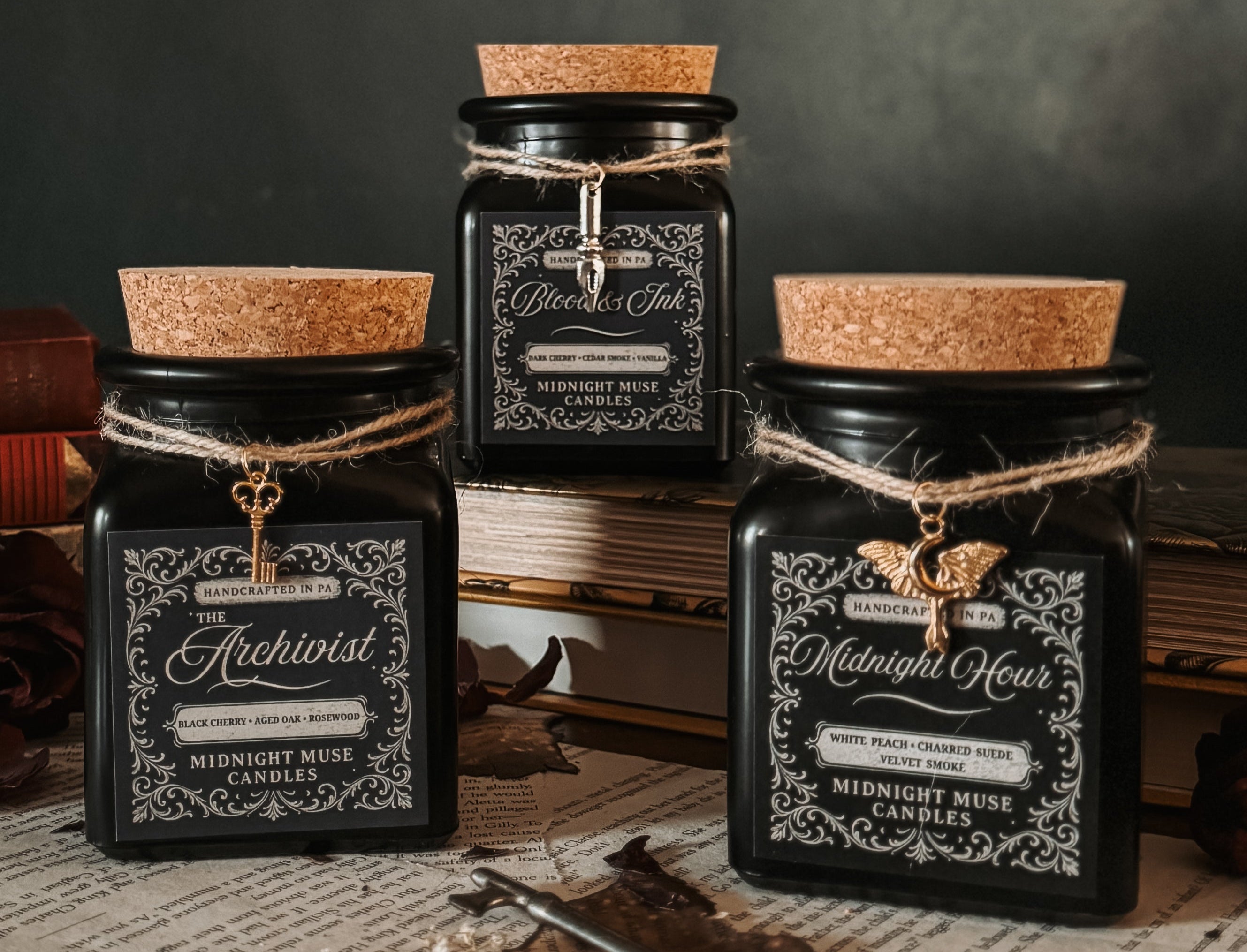Set of black jars with cork lids on a dark background